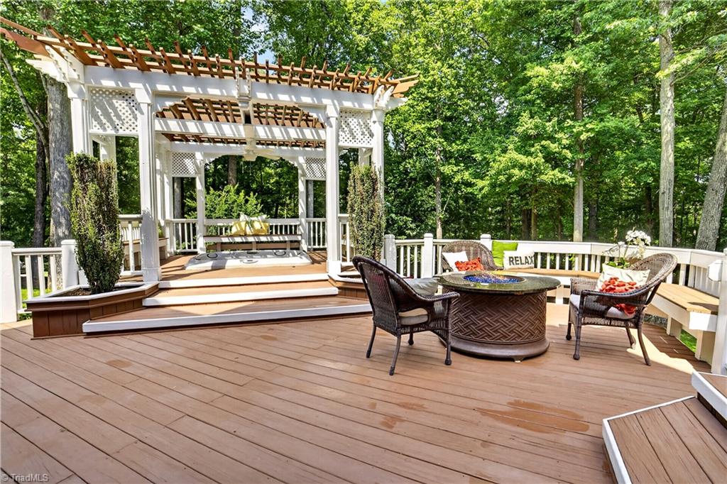 8508 Rosedale Drive Oak Ridge, NC 27310 - Photo 45 of 50 Unwind under the pergola as the day winds down.