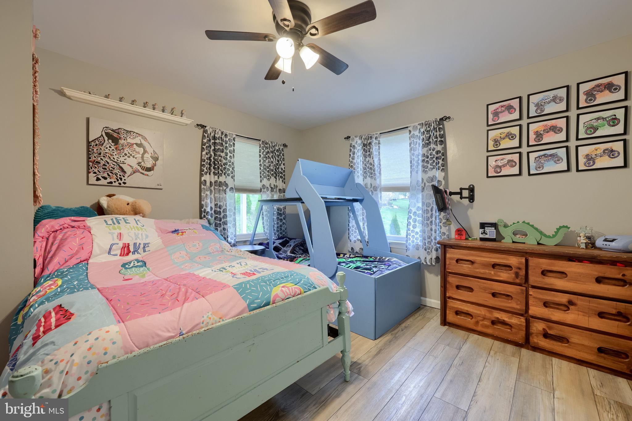 479 Hilldale Road Holtwood, PA 17532 - Photo 13 of 51 a bedroom with a bed and wooden floor