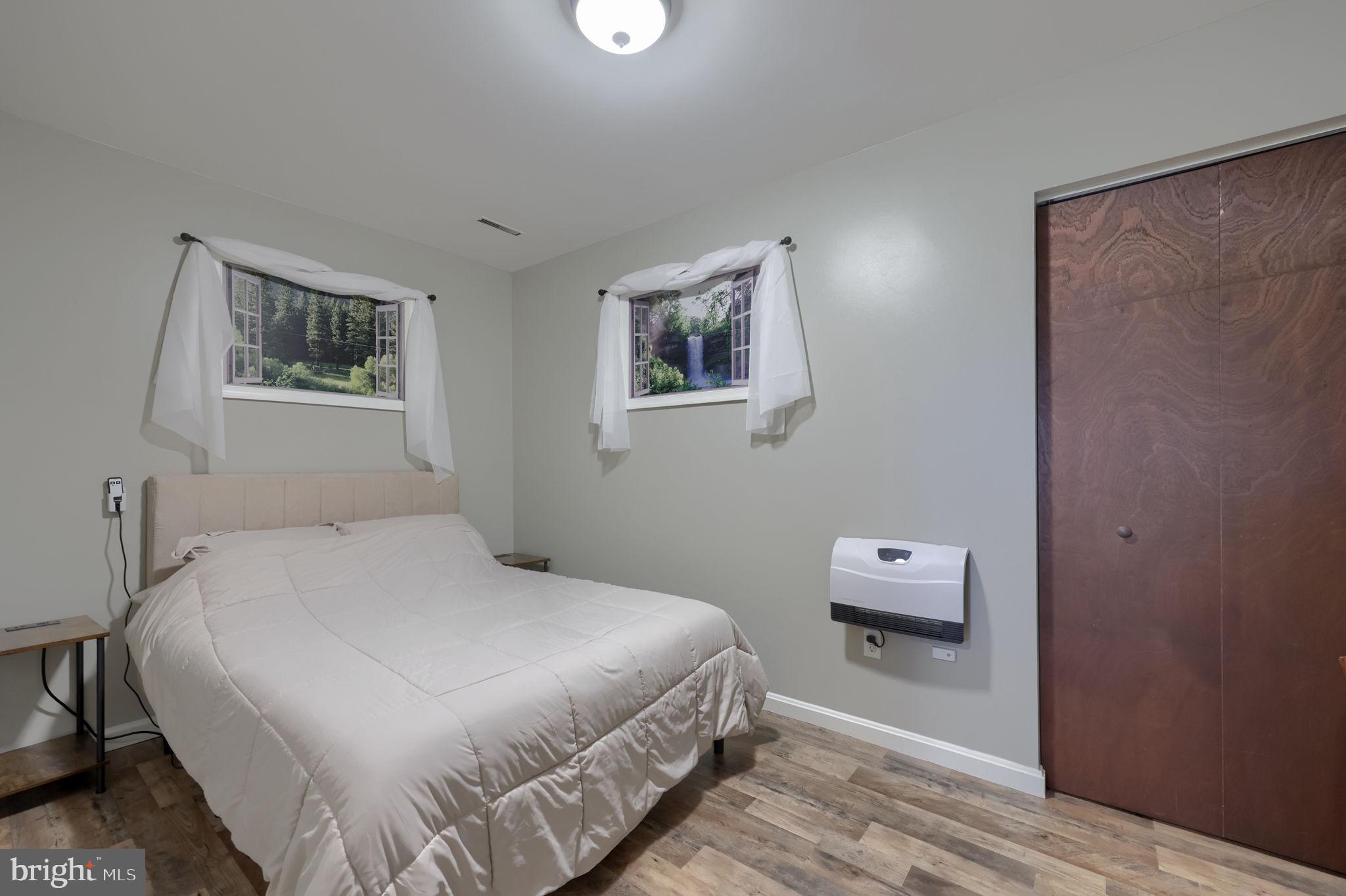 479 Hilldale Road Holtwood, PA 17532 - Photo 14 of 51 a bedroom with a bed and a window