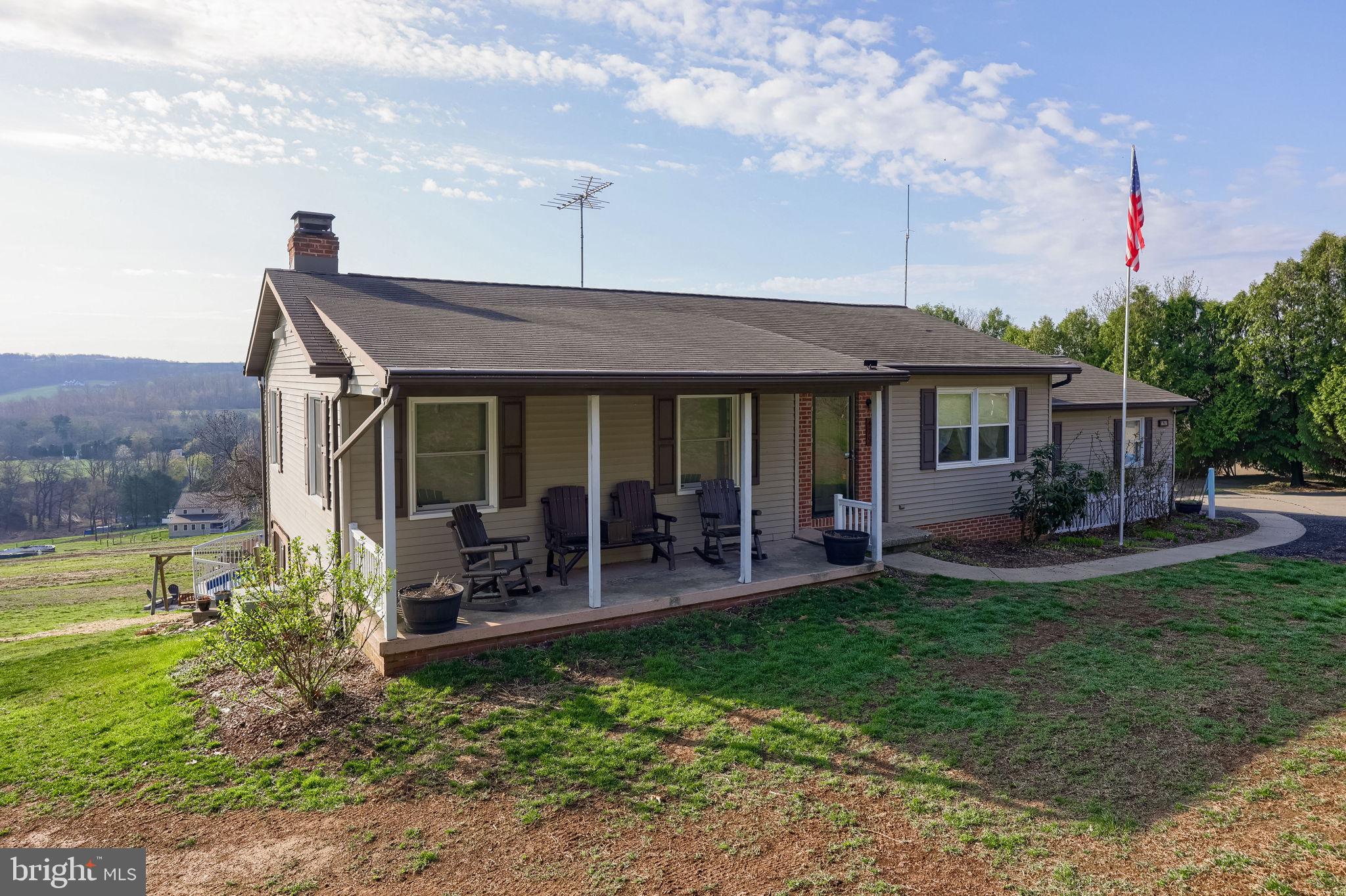 479 Hilldale Road Holtwood, PA 17532 - Photo 25 of 51 a front view of a house with a garden and patio