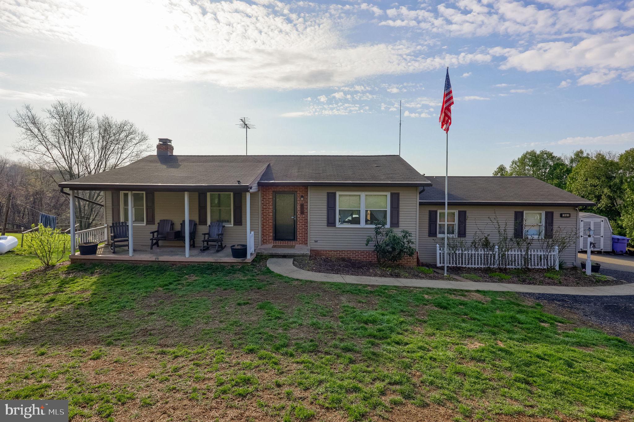 479 Hilldale Road Holtwood, PA 17532 - Photo 29 of 51 a front view of a house with a garden and trees