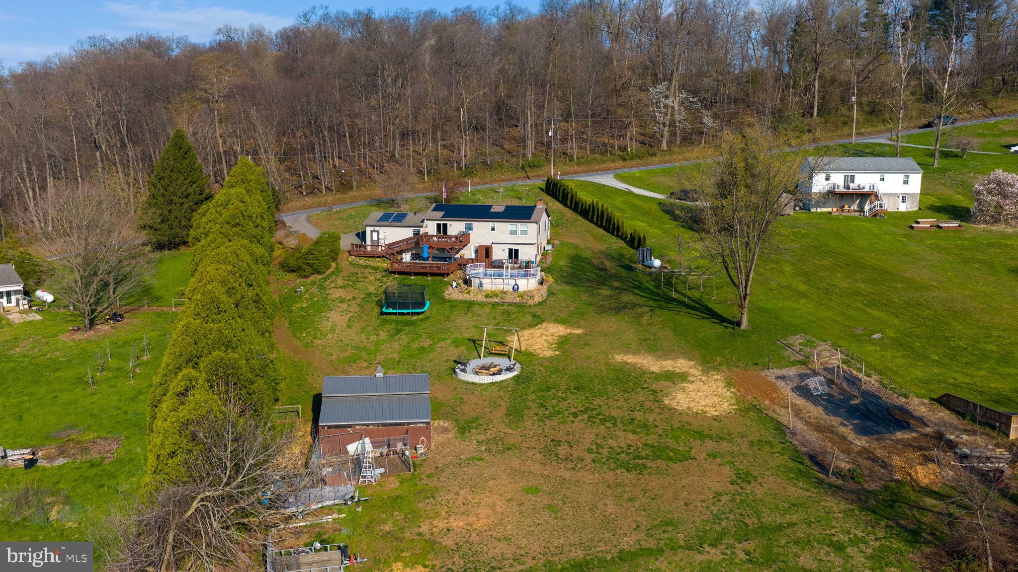 479 Hilldale Road Holtwood, PA 17532 - Photo 4 of 51 a view of a lake with a house in the background