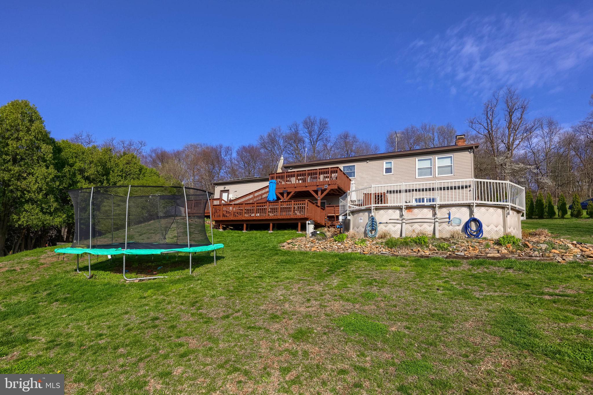 479 Hilldale Road Holtwood, PA 17532 - Photo 44 of 51 a view of a house with a backyard and a yard