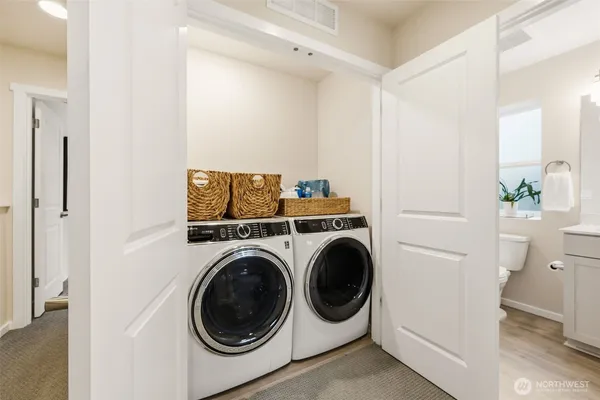 a utility room with dryer and washer