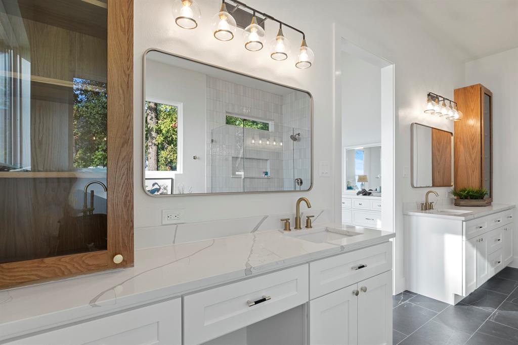 644 North Private Road Leesburg, TX 75451 - Photo 14 of 40 a bathroom with a sink and a mirror