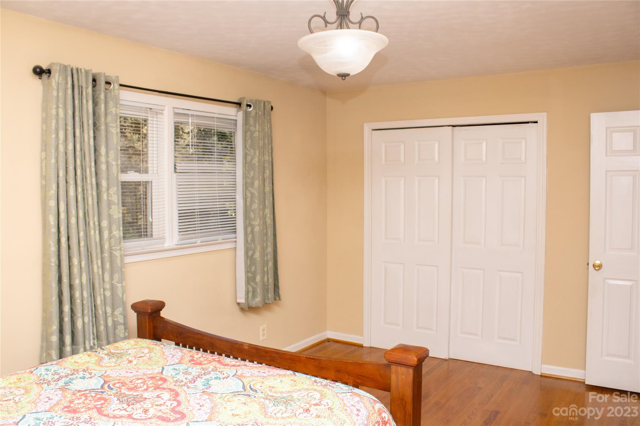 1030 Martin Road Hickory Grove, SC 29717 - Photo 17 of 22 a bedroom with a bed and a window