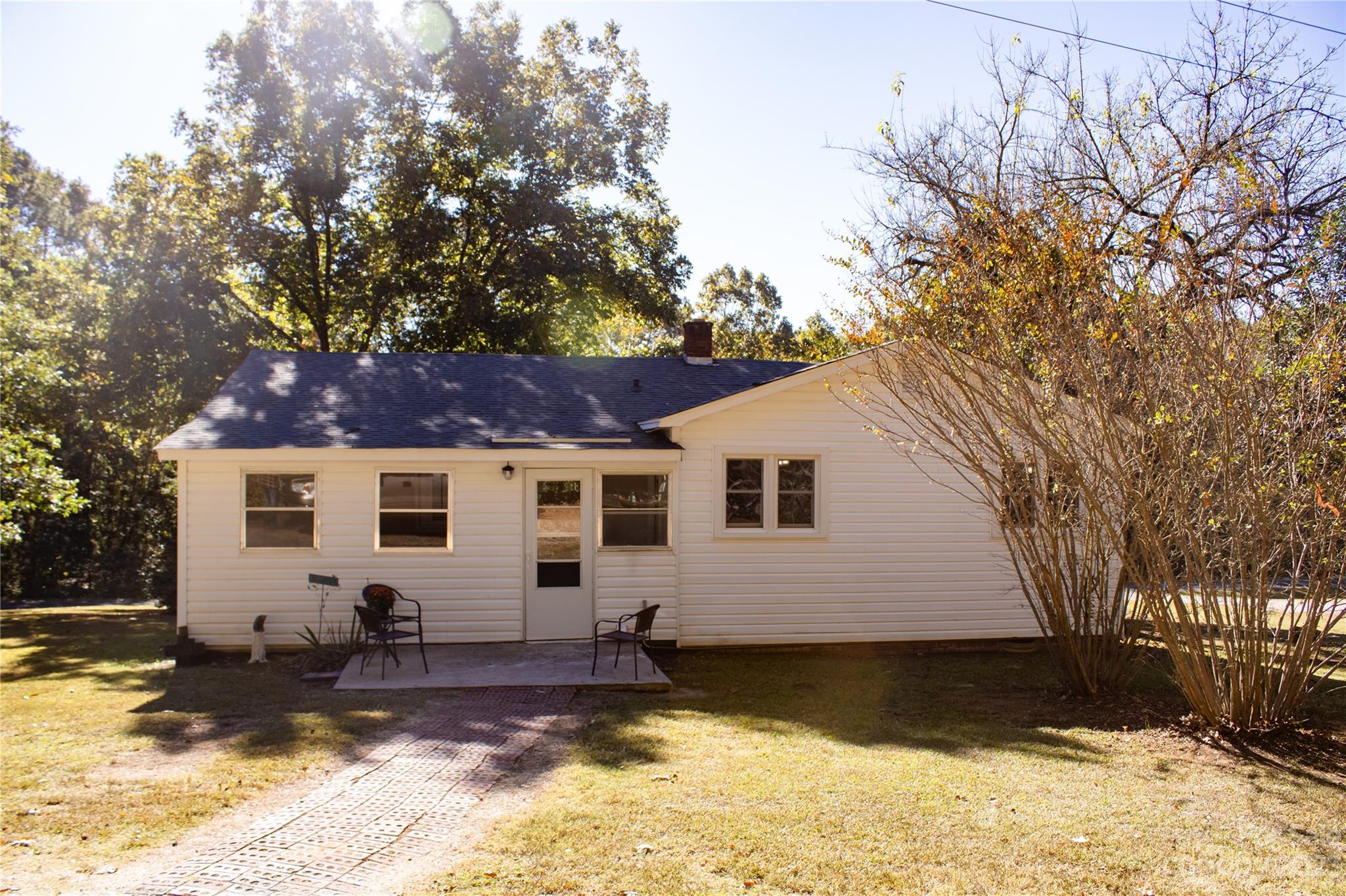 1030 Martin Road Hickory Grove, SC 29717 - Photo 6 of 22 a front view of a house with a yard covered with snow