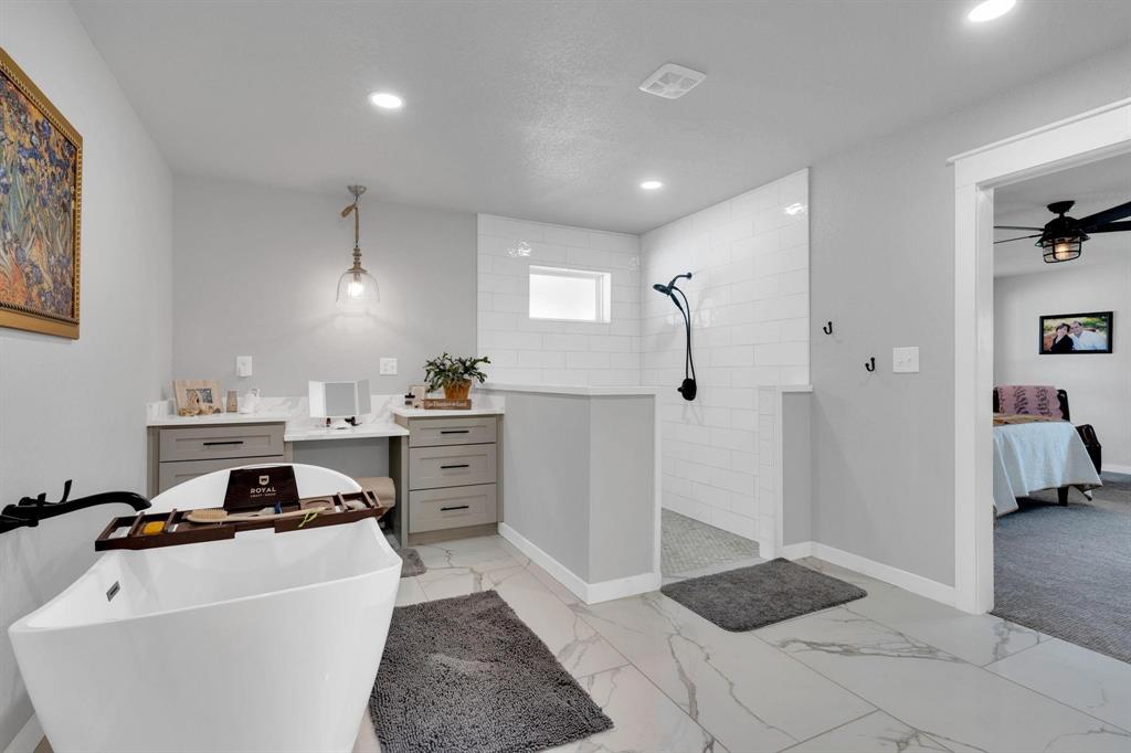 1467 Brown Road Palo Pinto, TX 76484 - Photo 27 of 38 a kitchen with a refrigerator and a stove top oven