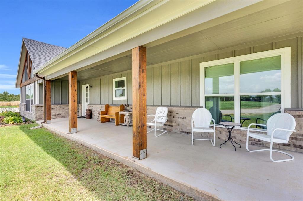 1467 Brown Road Palo Pinto, TX 76484 - Photo 6 of 38 a view of swimming pool with lawn chairs and couches