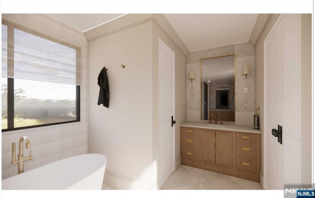 331 Lockwood Drive Paramus, NJ 07652 - Photo 20 of 33 a bathroom with a toilet sink and mirror