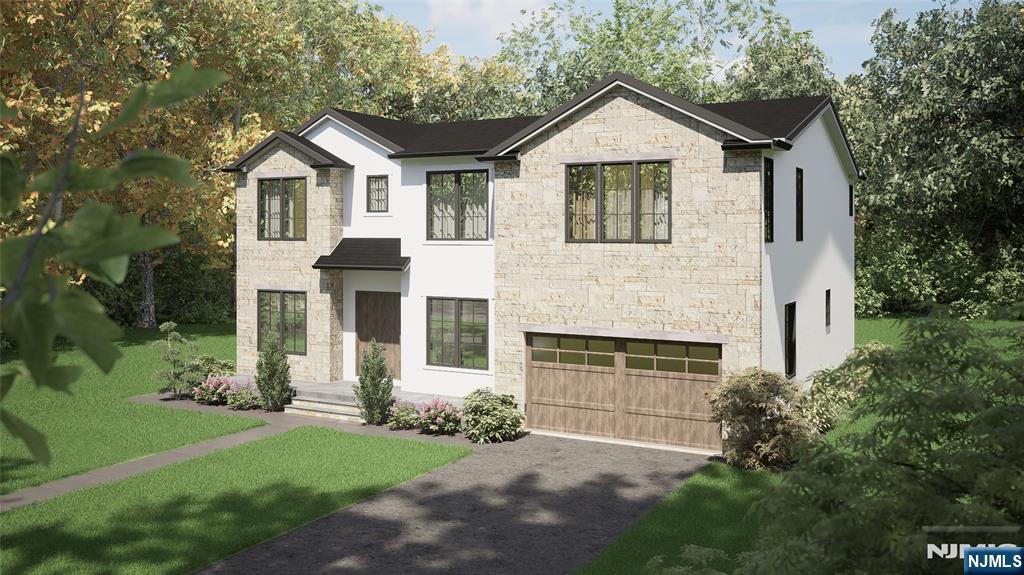 331 Lockwood Drive Paramus, NJ 07652 - Photo 3 of 33 a front view of a house with a garden and yard