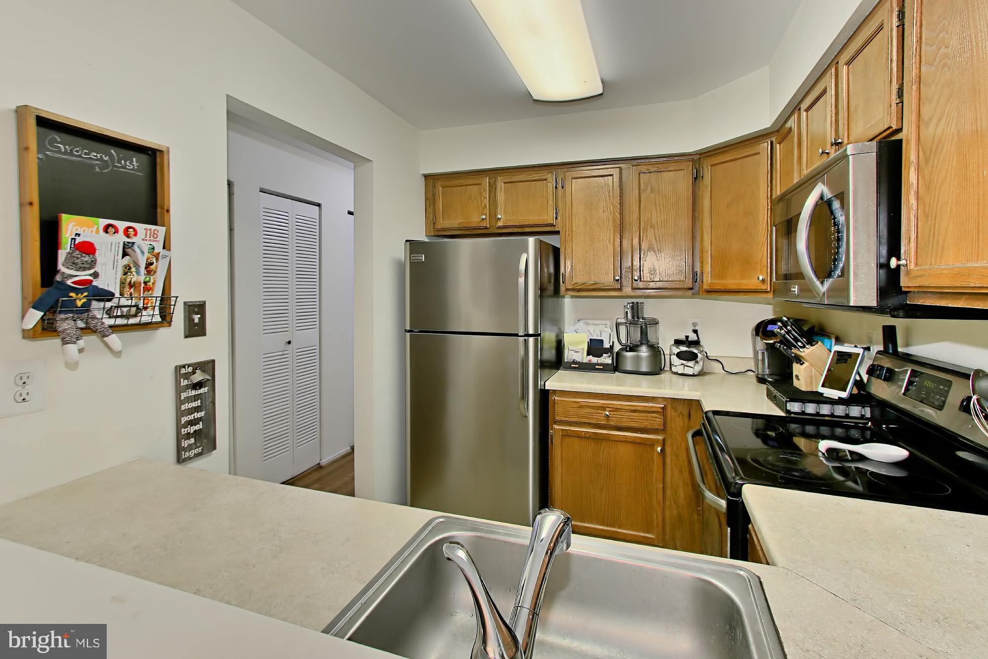 7705 Lexton Place, Unit C Springfield, VA 22152 - Photo 12 of 29 Tiered counters offers extra work space