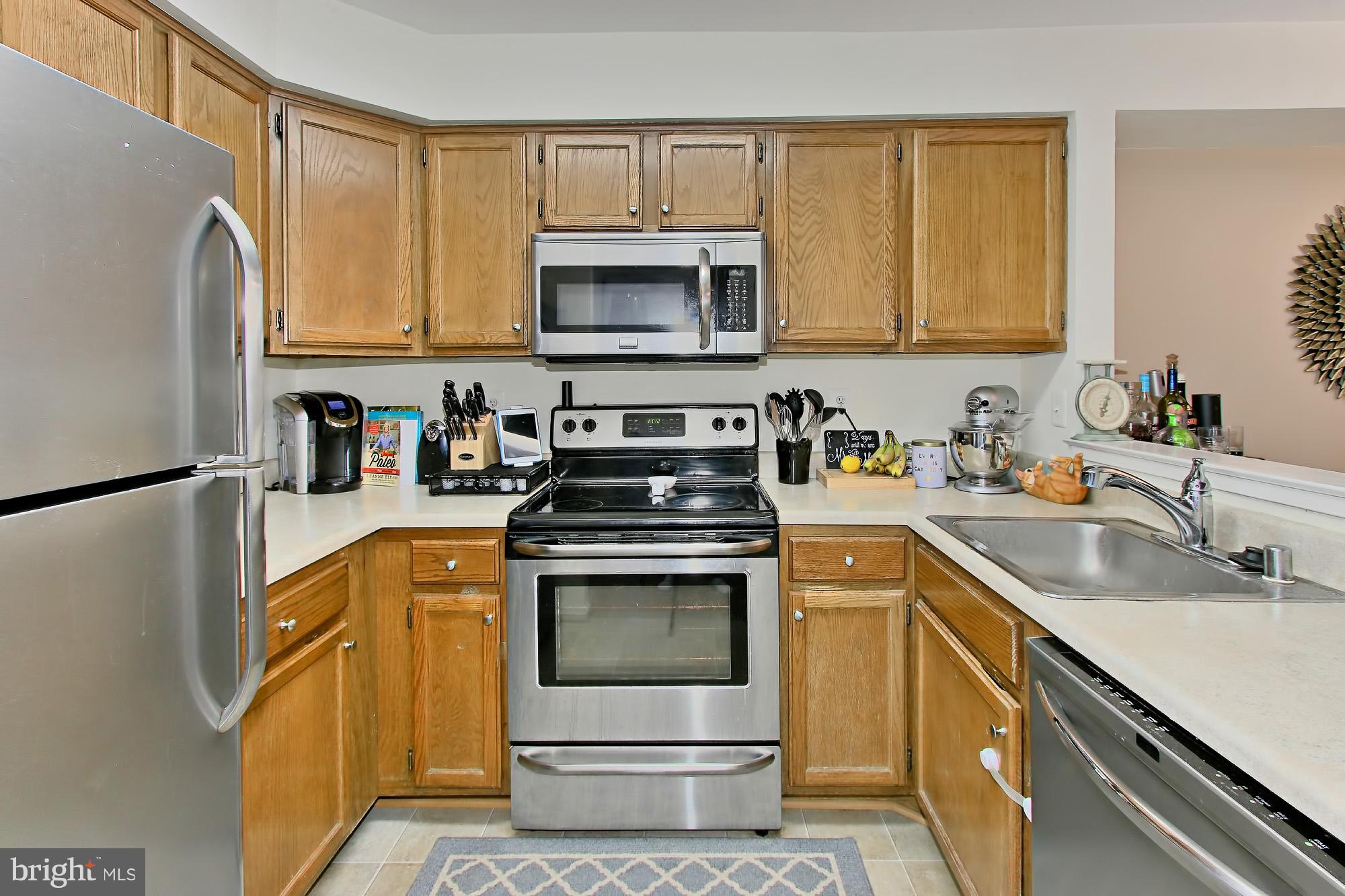 7705 Lexton Place, Unit C Springfield, VA 22152 - Photo 13 of 29 Kitchen features quality SS appliances