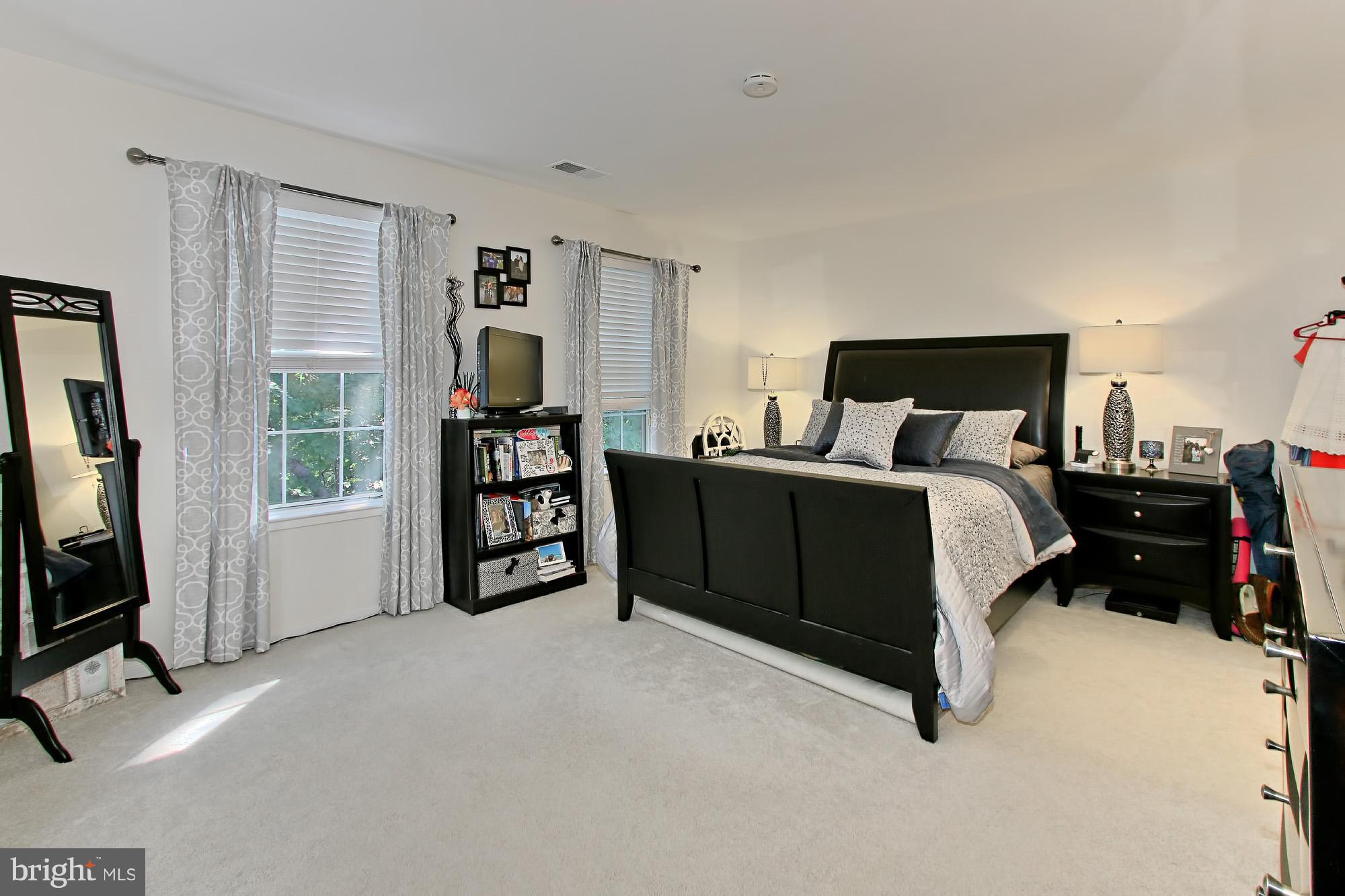 7705 Lexton Place, Unit C Springfield, VA 22152 - Photo 14 of 29 Master BR features plush carpet and walk-in closet