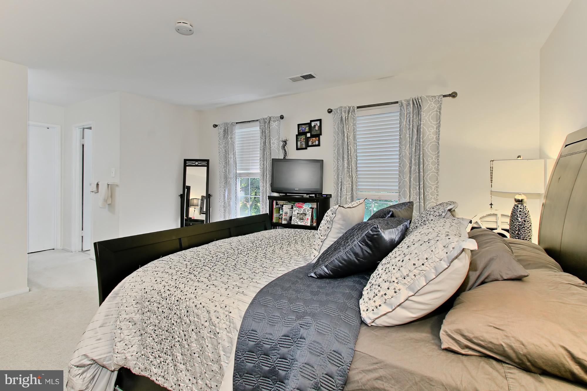 7705 Lexton Place, Unit C Springfield, VA 22152 - Photo 15 of 29 Spacious Master bedroom w/ 2 large windows
