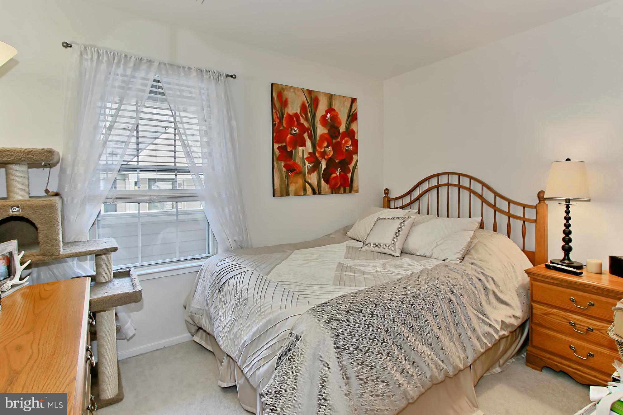 7705 Lexton Place, Unit C Springfield, VA 22152 - Photo 20 of 29 2nd bright and cheerful bedroom