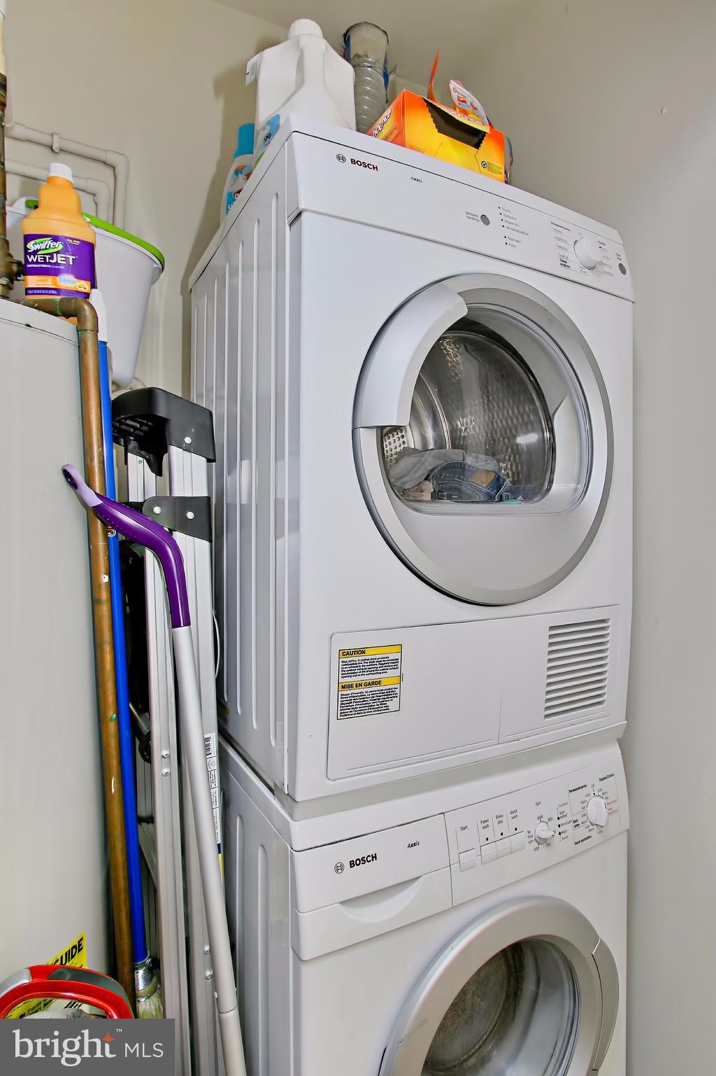 7705 Lexton Place, Unit C Springfield, VA 22152 - Photo 22 of 29 Full sized, front-loading Bosch washer and dryer