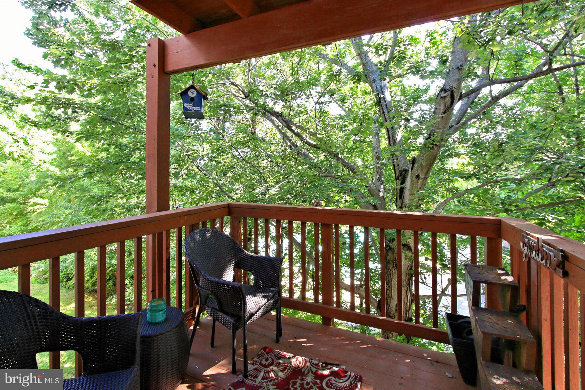 7705 Lexton Place, Unit C Springfield, VA 22152 - Photo 23 of 29 Private covered terrace with lush greenery views