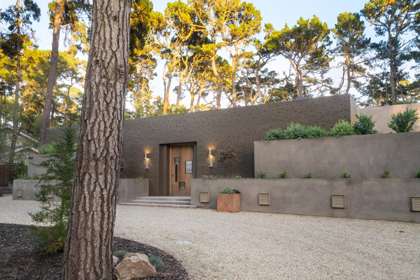 4064 Ronda Road Pebble Beach, CA 93953 - Photo 1 of 19 front view of a house with a tree