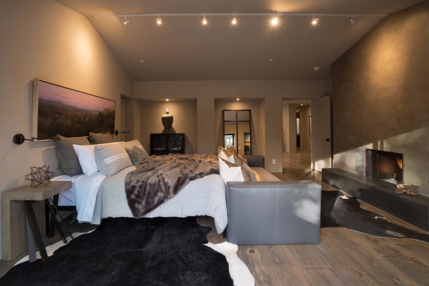 4064 Ronda Road Pebble Beach, CA 93953 - Photo 12 of 19 a living room with furniture and a flat screen tv