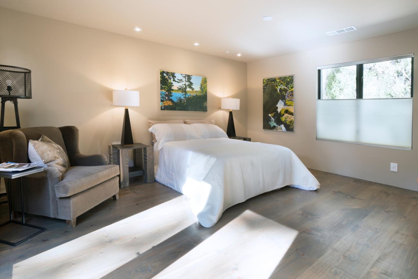4064 Ronda Road Pebble Beach, CA 93953 - Photo 15 of 19 a bedroom with a bed and couch