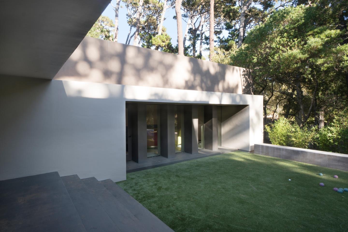4064 Ronda Road Pebble Beach, CA 93953 - Photo 18 of 19 a view of a house with a yard