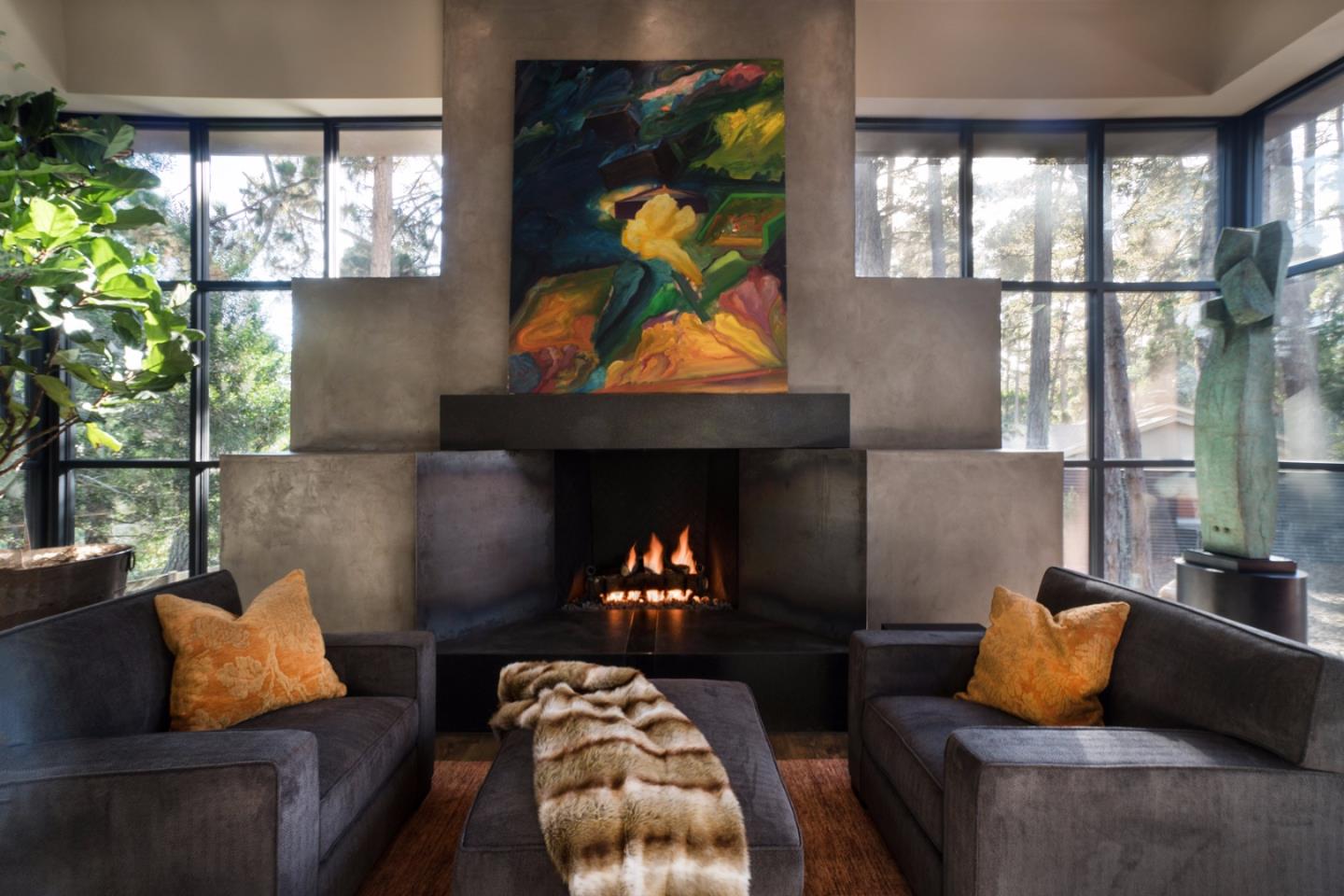 4064 Ronda Road Pebble Beach, CA 93953 - Photo 4 of 19 a living room with furniture and a fireplace