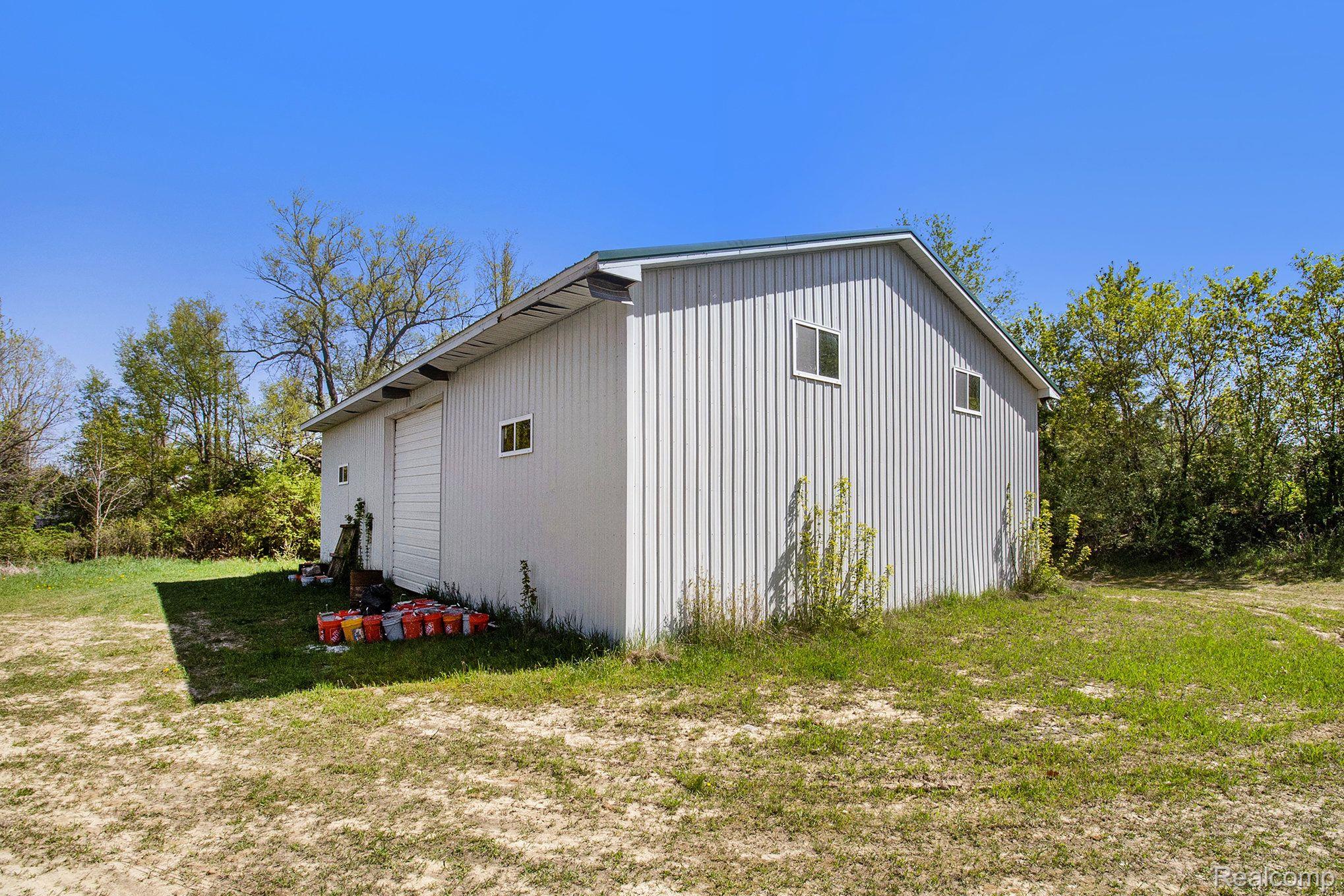 3784 East Allen Road Howell, MI 48855 - Photo 36 of 42 40'x60' PB w/dirt flr & 2-14" x 14" Overhead doors