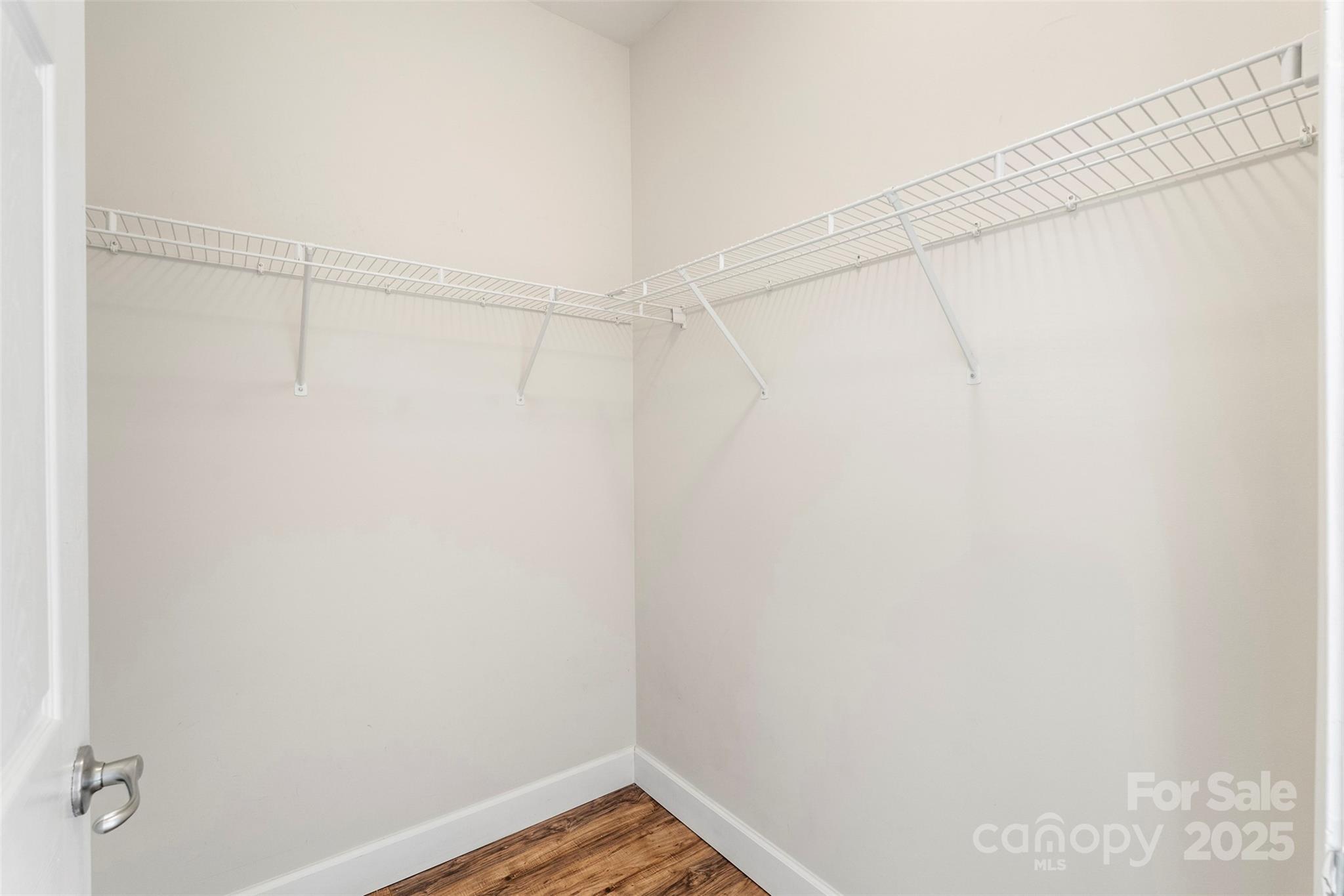 3805 Balsam Street, Unit 321 Indian Trail, NC 28079 - Photo 21 of 47 a view of a room with racks on the wall