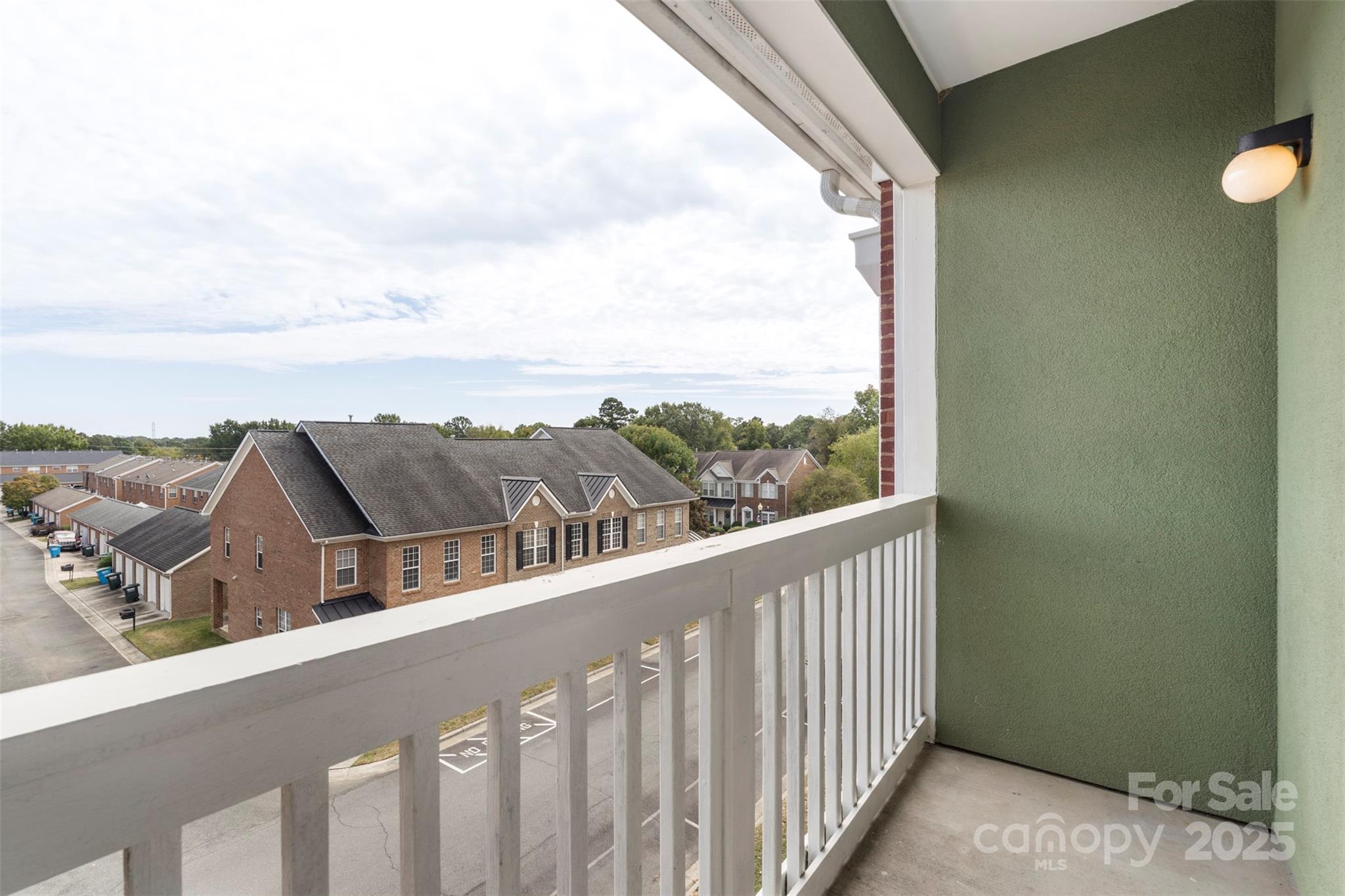 3805 Balsam Street, Unit 321 Indian Trail, NC 28079 - Photo 27 of 47 a view of a city from a balcony