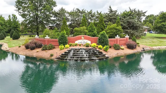a view of a patio with table and chairs and potted plants