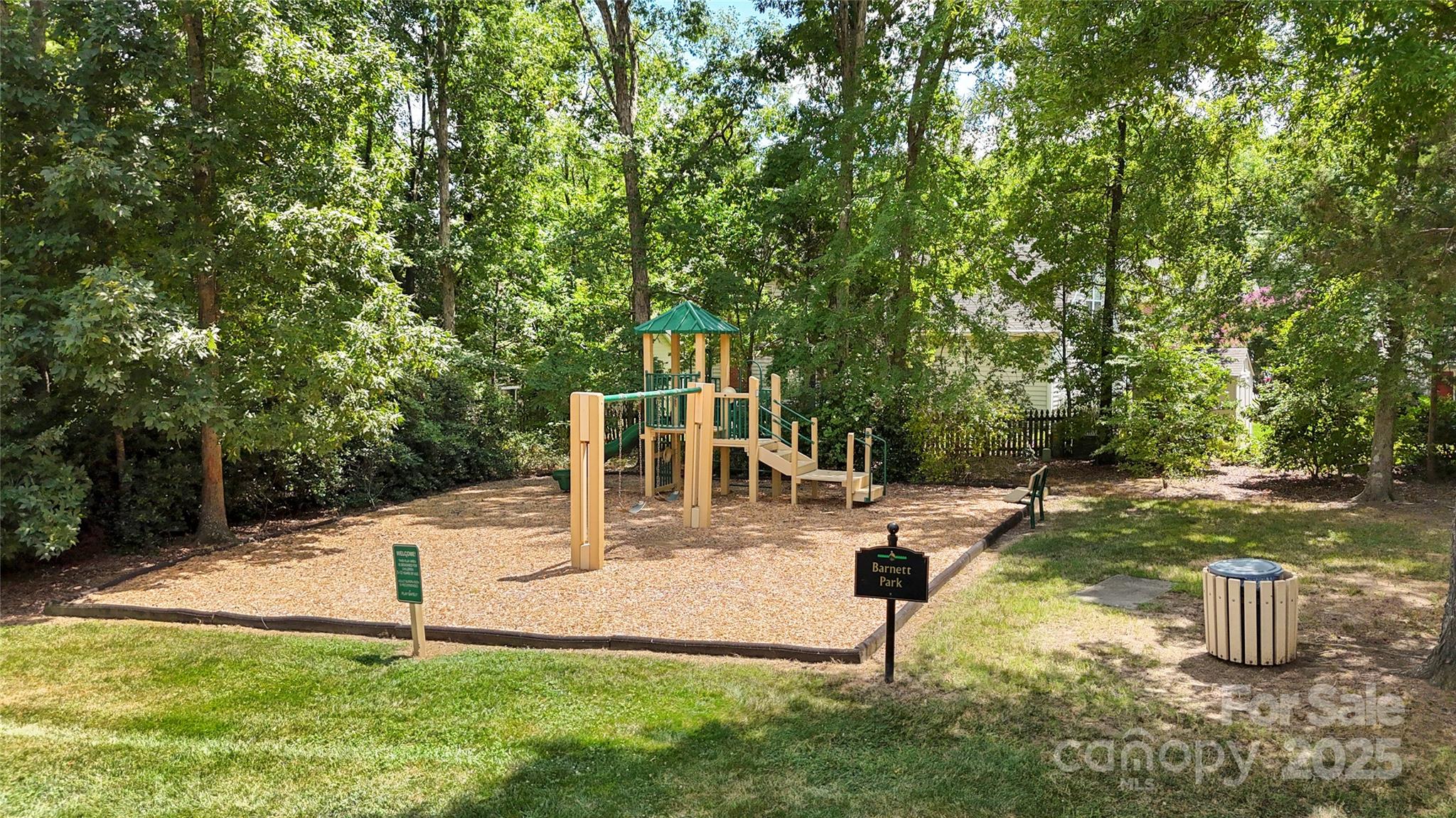 3805 Balsam Street, Unit 321 Indian Trail, NC 28079 - Photo 34 of 47 a view of a backyard with swimming pool