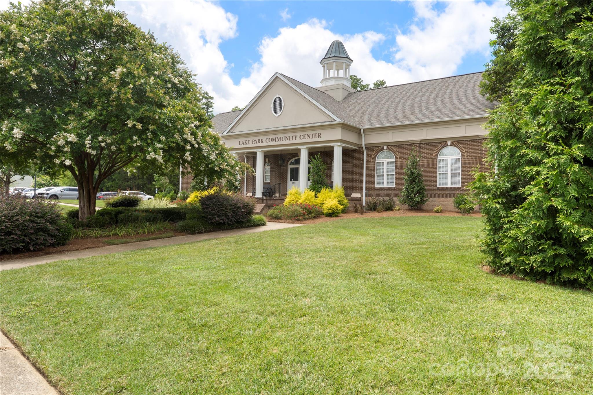 3805 Balsam Street, Unit 321 Indian Trail, NC 28079 - Photo 36 of 47 a front view of a house with garden