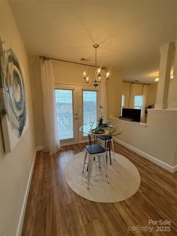 a spacious bathroom with a double vanity sink toilet and shower