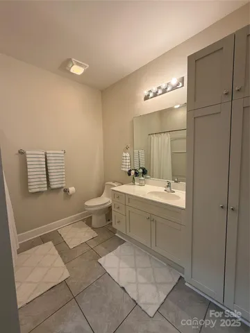 a kitchen with a refrigerator sink and stove