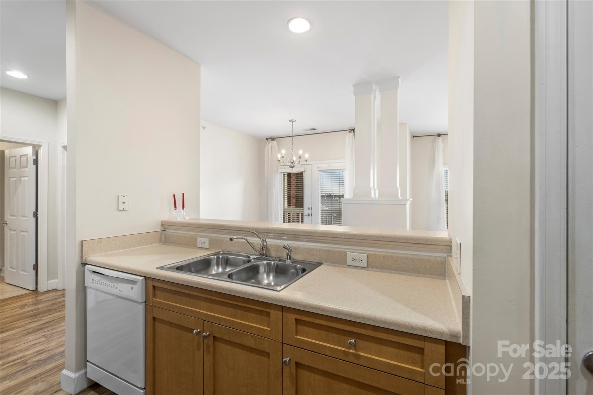 3805 Balsam Street, Unit 321 Indian Trail, NC 28079 - Photo 9 of 47 a bathroom with a sink and a mirror