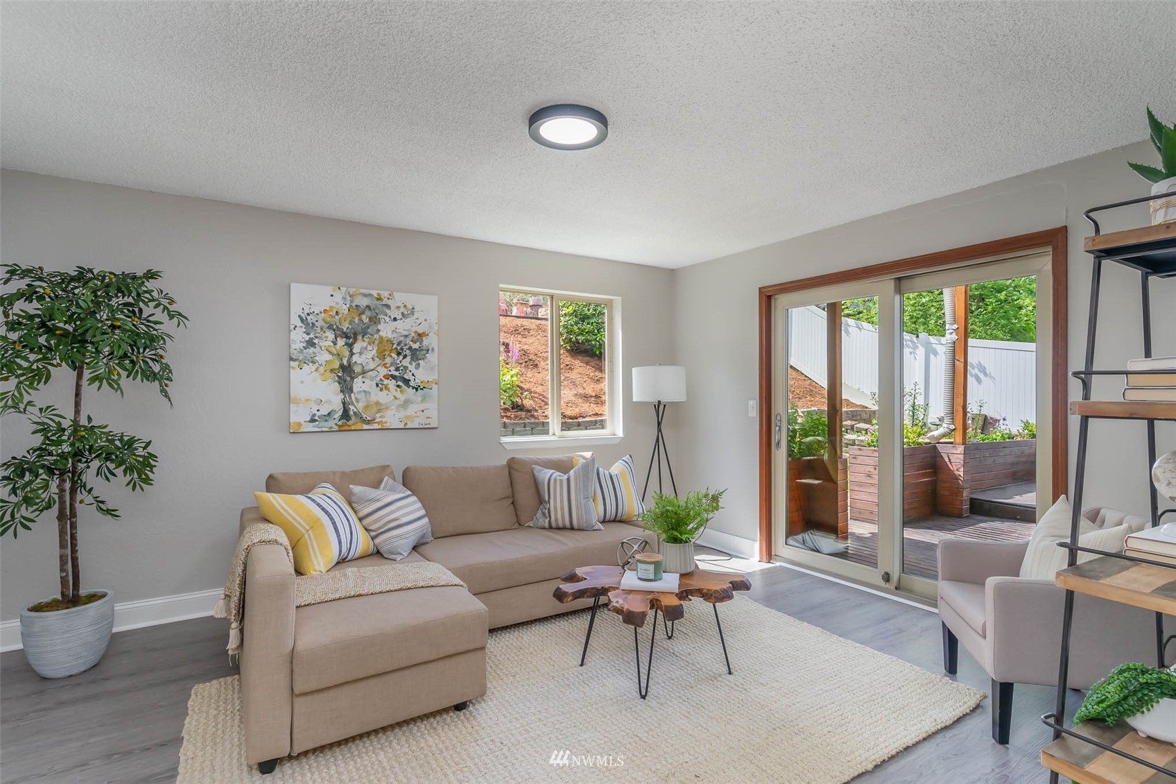 18120 19th Drive Southeast Bothell, WA 98012 - Photo 14 of 31 a living room with furniture and a potted plant