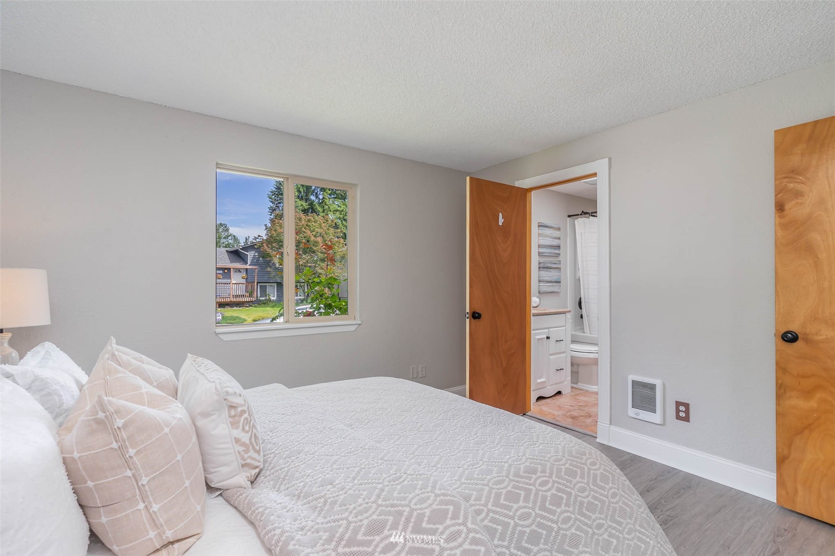 18120 19th Drive Southeast Bothell, WA 98012 - Photo 22 of 31 a bedroom with a bed and a window
