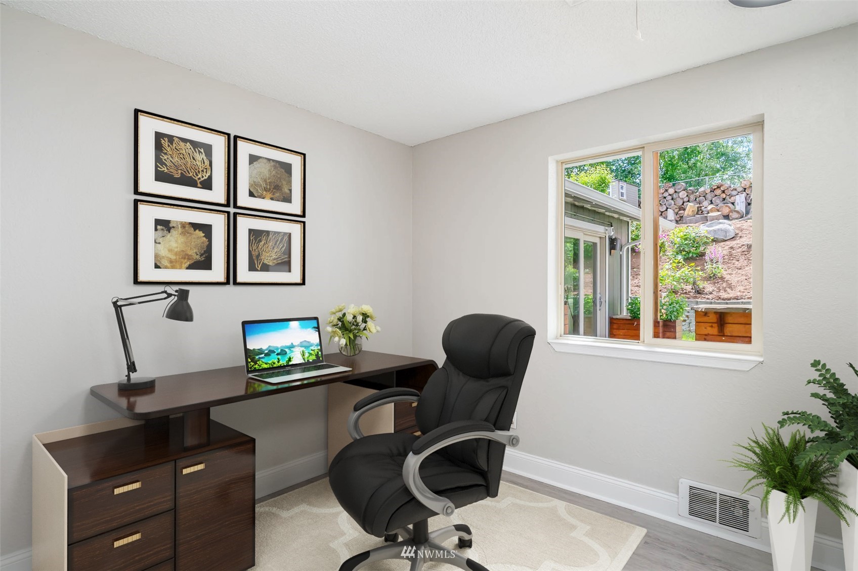 18120 19th Drive Southeast Bothell, WA 98012 - Photo 24 of 31 a view of a workspace with furniture and a window