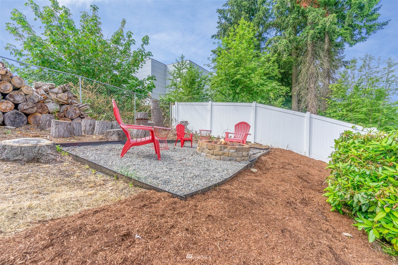 18120 19th Drive Southeast Bothell, WA 98012 - Photo 30 of 31 a backyard of a house with table and chairs