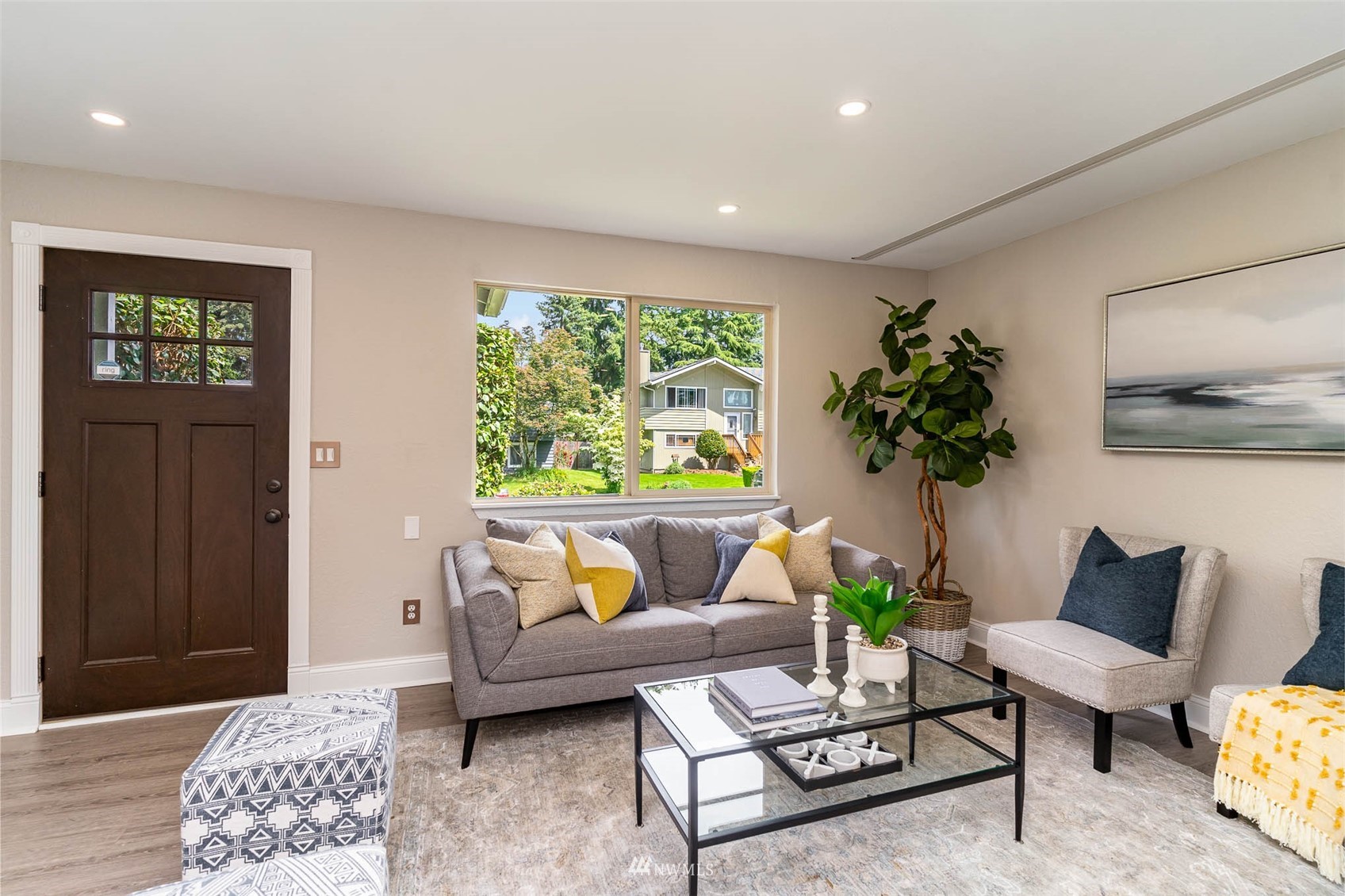18120 19th Drive Southeast Bothell, WA 98012 - Photo 5 of 31 a living room with furniture and a potted plant