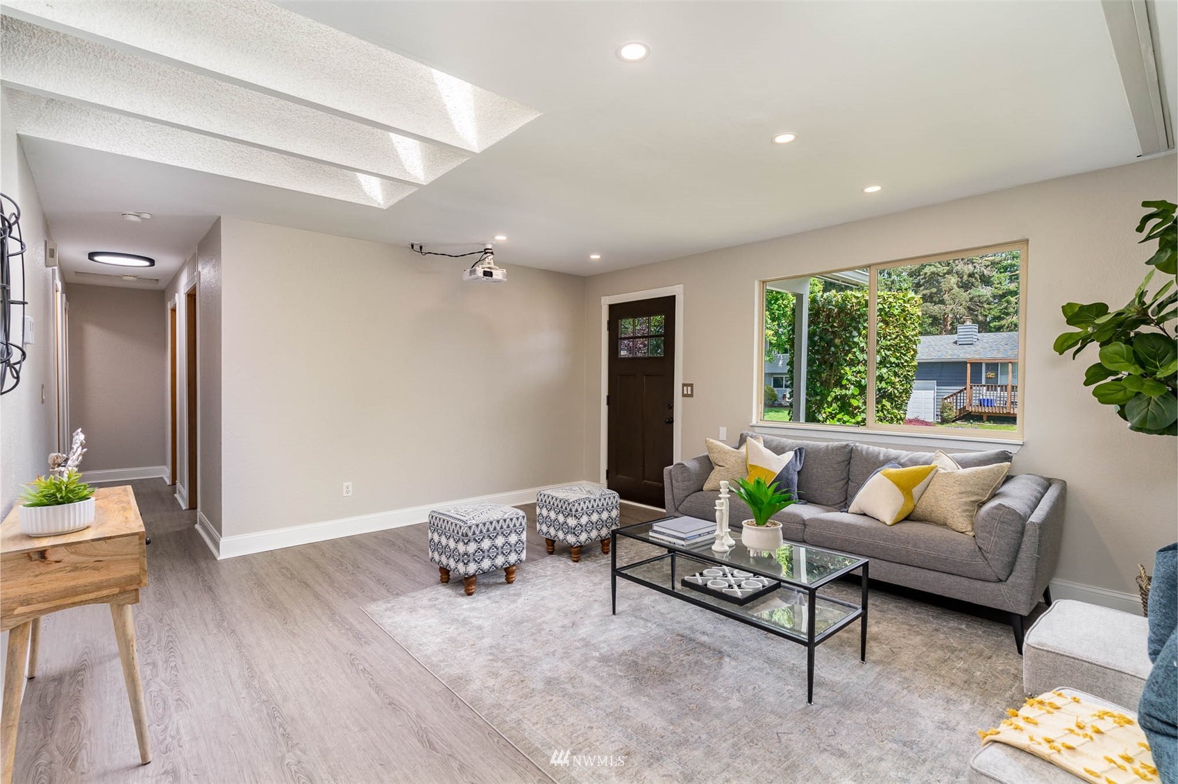 18120 19th Drive Southeast Bothell, WA 98012 - Photo 6 of 31 a living room with furniture and a large window