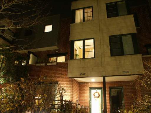 a front view of a building with glass windows