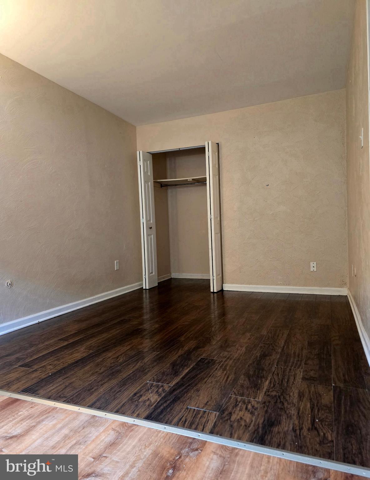 1136 Fox Run Reading, PA 19606 - Photo 17 of 27 a view of an empty room with wooden floor and a window