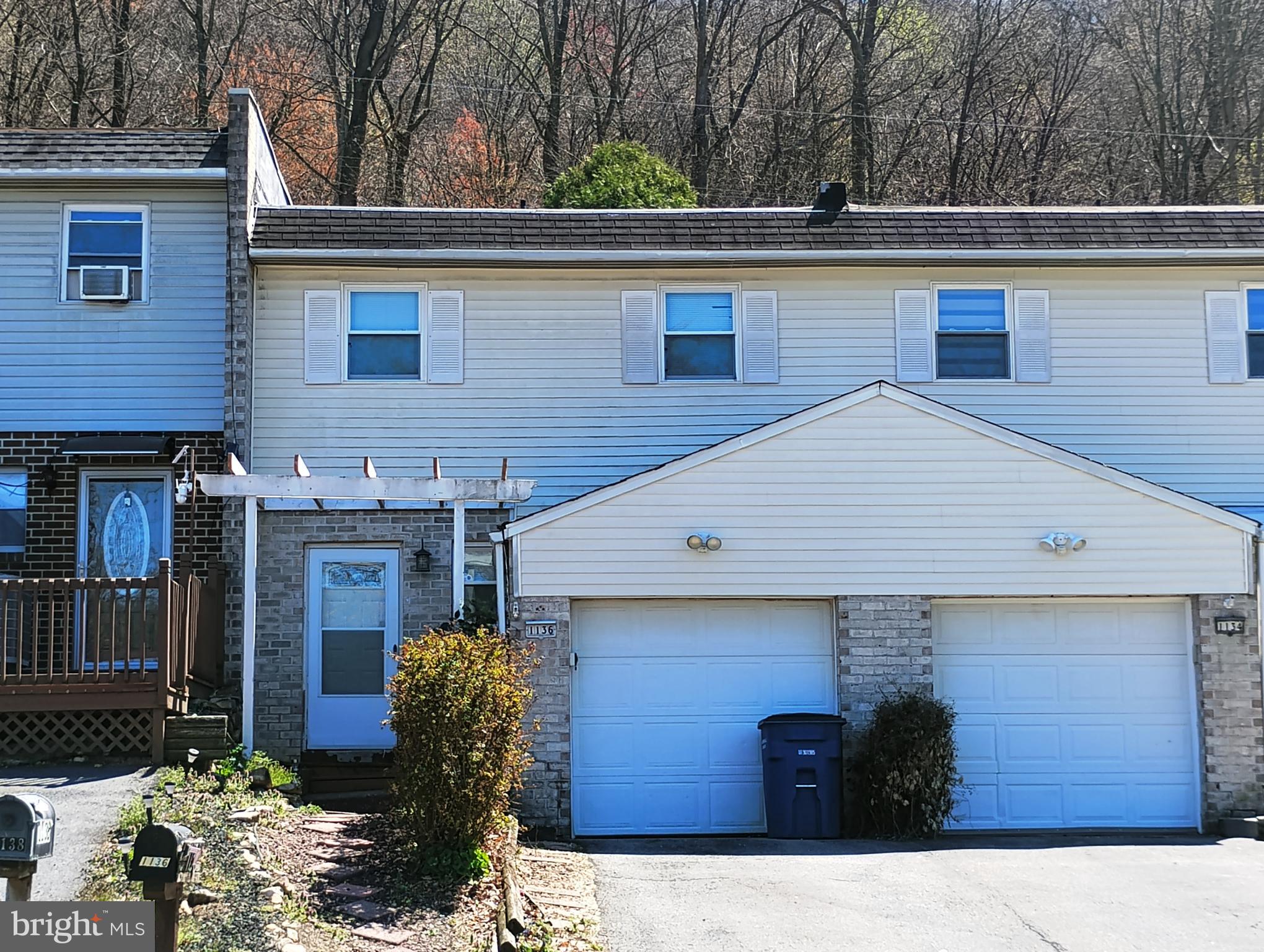 1136 Fox Run Reading, PA 19606 - Photo 2 of 27 a front view of a house with garden
