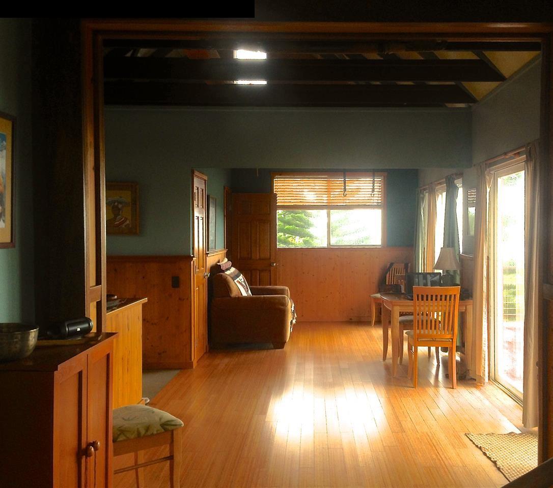51 South Honokala Road Haiku, HI 96708 - Photo 13 of 28 a living room with furniture and a wooden floor