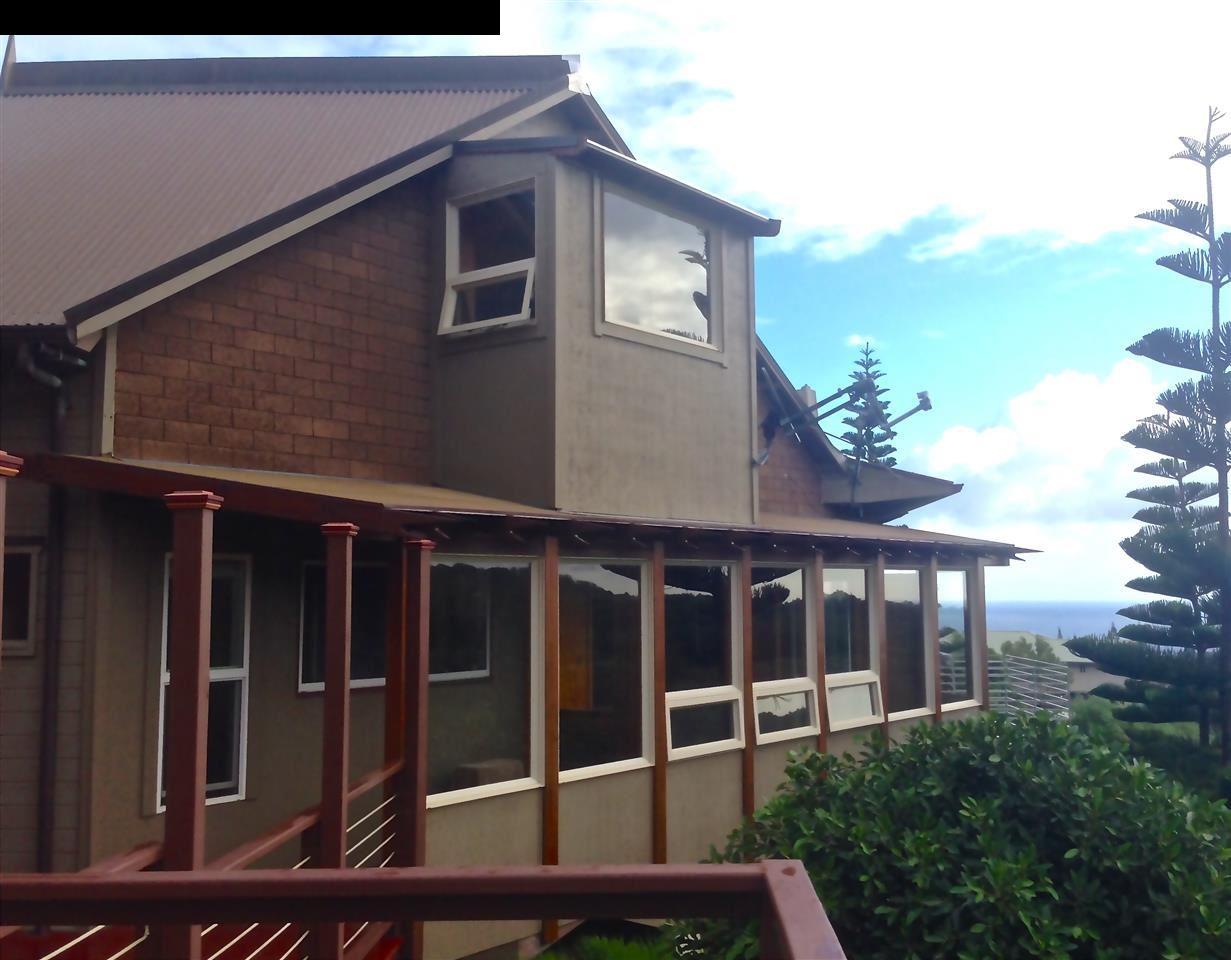 51 South Honokala Road Haiku, HI 96708 - Photo 6 of 28 a view of a house with roof deck