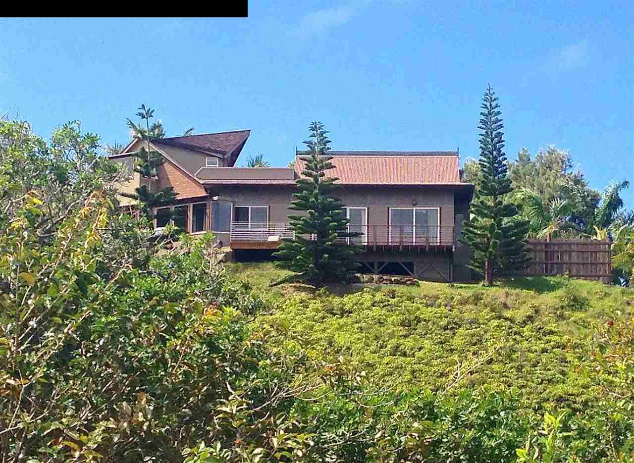 51 South Honokala Road Haiku, HI 96708 - Photo 8 of 28 front view of a house with a yard