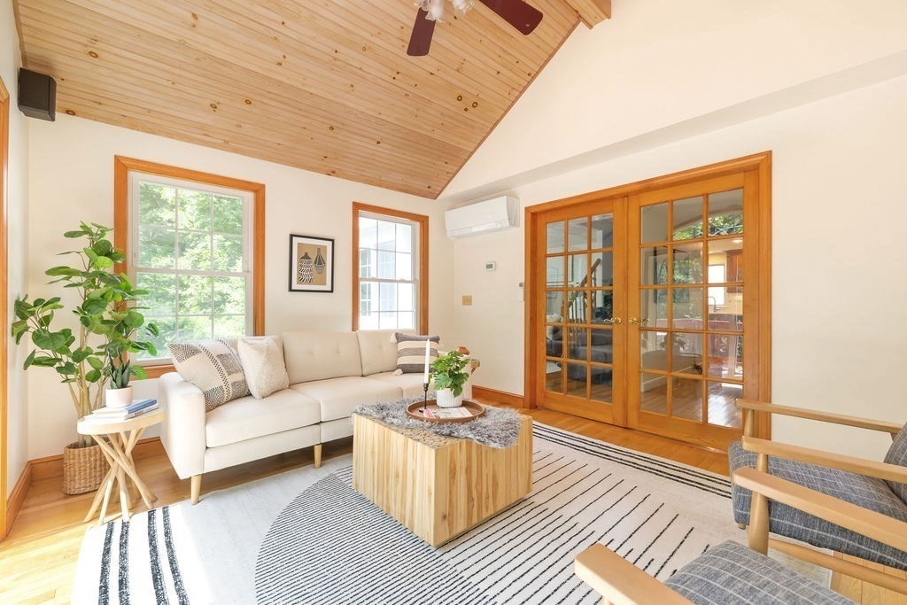 21 Vanderbelt Road Acton, MA 01720 - Photo 3 of 36 a living room with furniture and a large window
