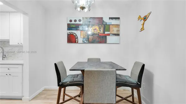 a workspace with furniture and wooden floor